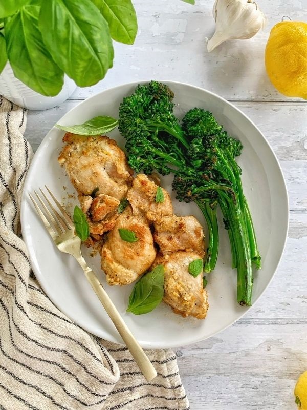 Instant Pot lemon garlic chicken is a quick & flavorful dinner meal! In less than 30 minutes, you'll have zesty chicken thighs on the table!