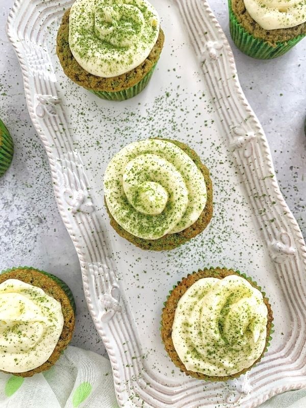 Matcha cupcakes with coconut frosting are fluffy, moist, & 100% whole wheat! Using natural ingredients, these cupcakes are perfectly sweet!