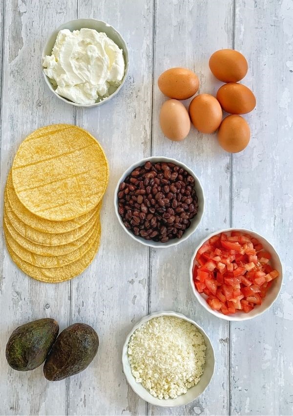 Corn tortillas, plain greek yogurt, eggs, black beans, diced tomatoes, and cojita cheese