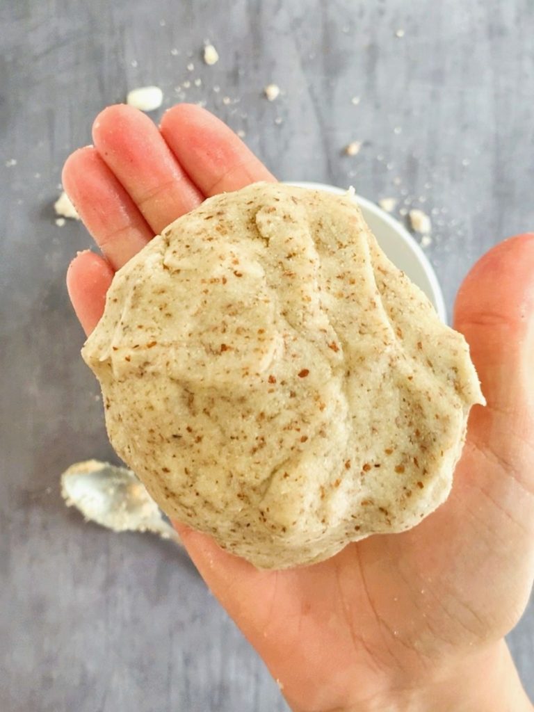 A ball of gluten-free crust dough.