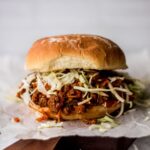 A healthy Instant Pot sloppy joe topped with cabbage.