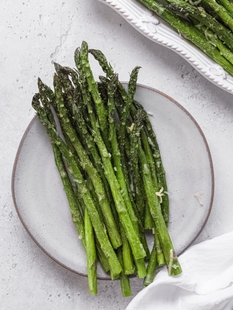 Air fryer asparagus on a plate.