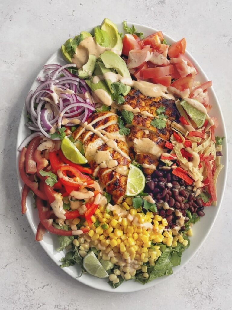 A spicy southwest chicken salad drizzled with southwest spicy ranch dressing.