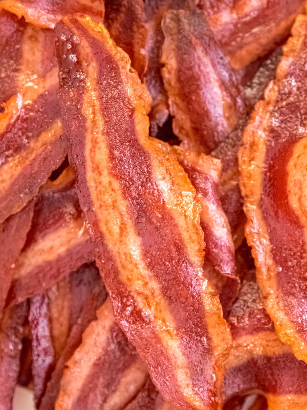 closeup on a pile of crispy air fried turkey bacon.