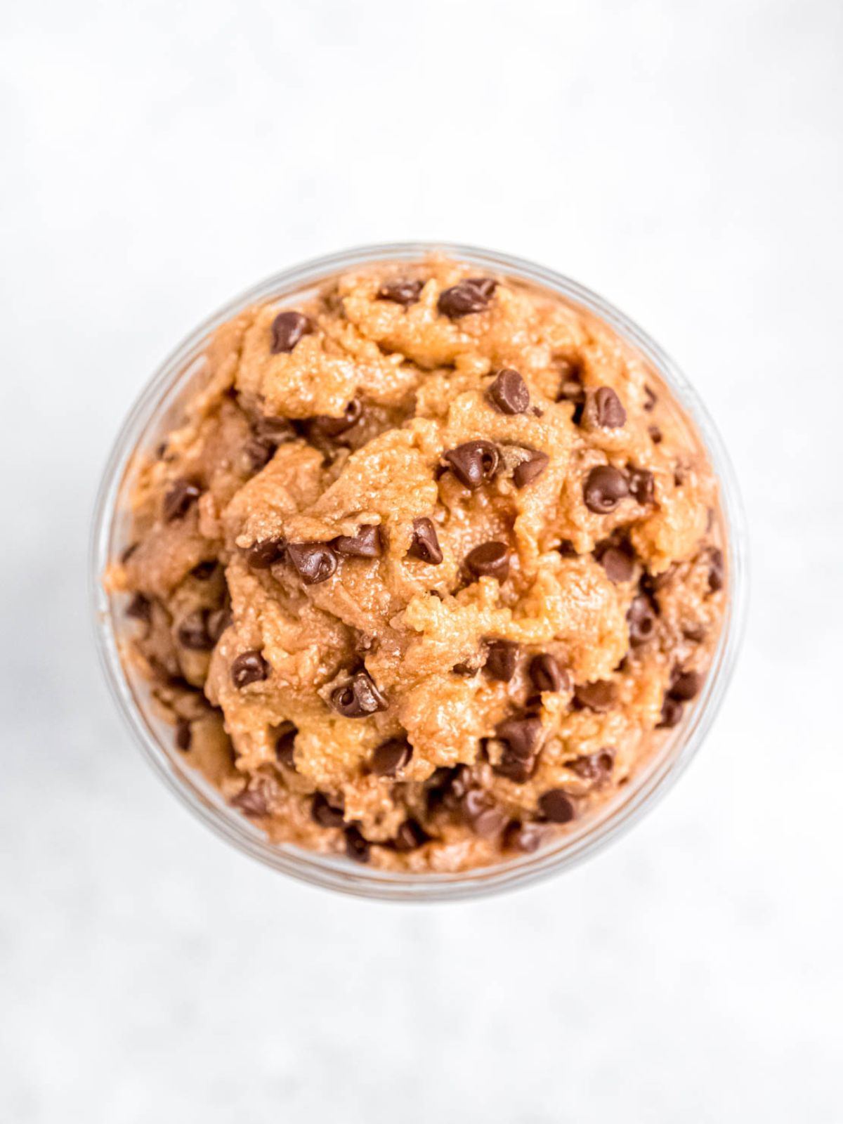 closeup overhead shot of chocolate chip protein cookie dough.
