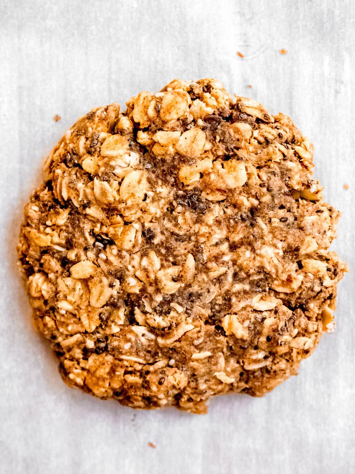closeup overhead shot of a breakfasty protein oat cookie.