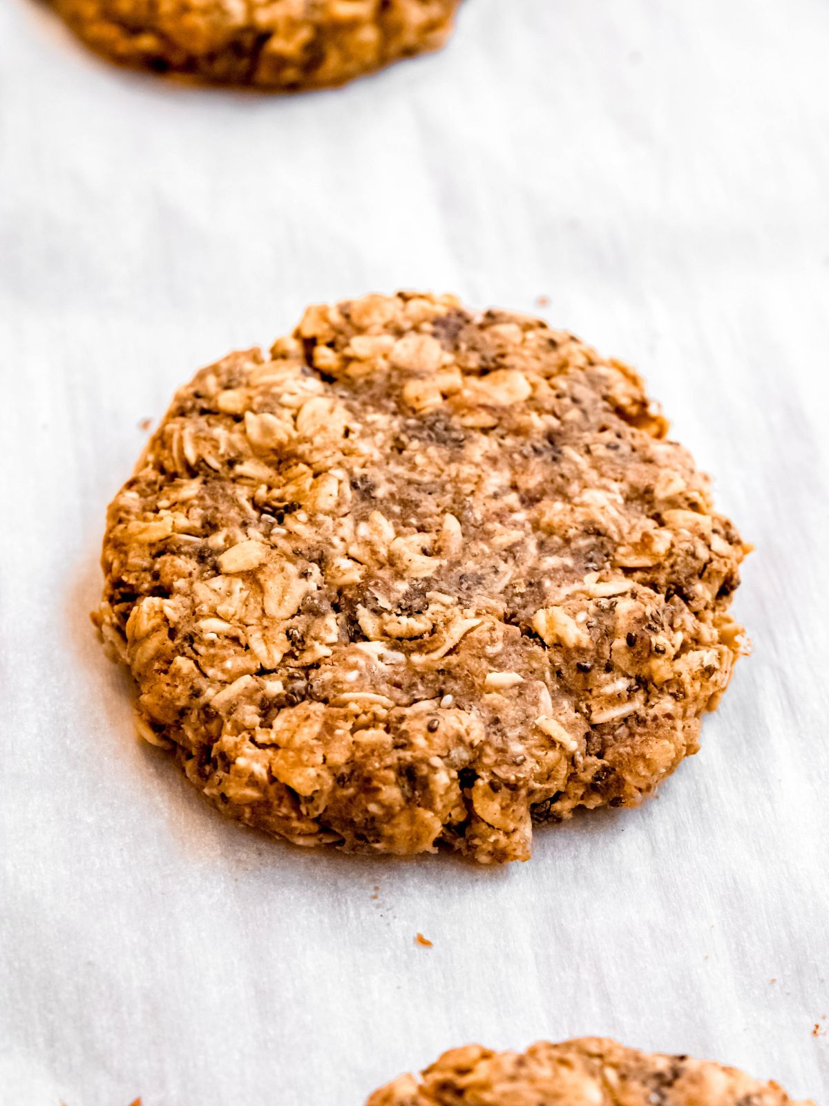 baked oatmeal protein cookie on a cookie sheet.