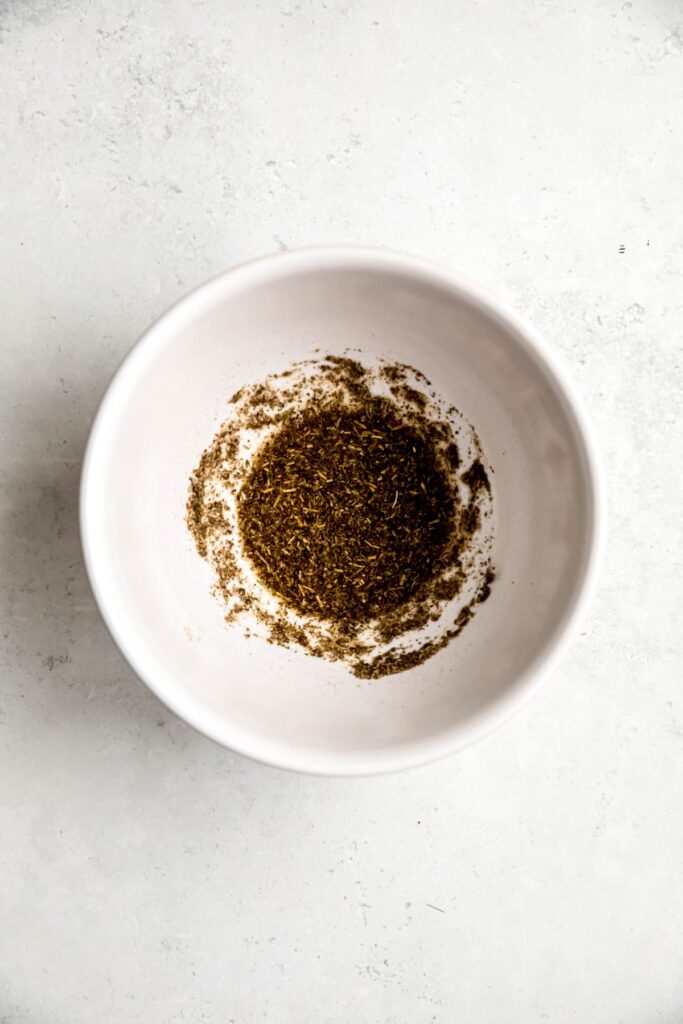 An overhead shot of a bowl of the chicken marinade.