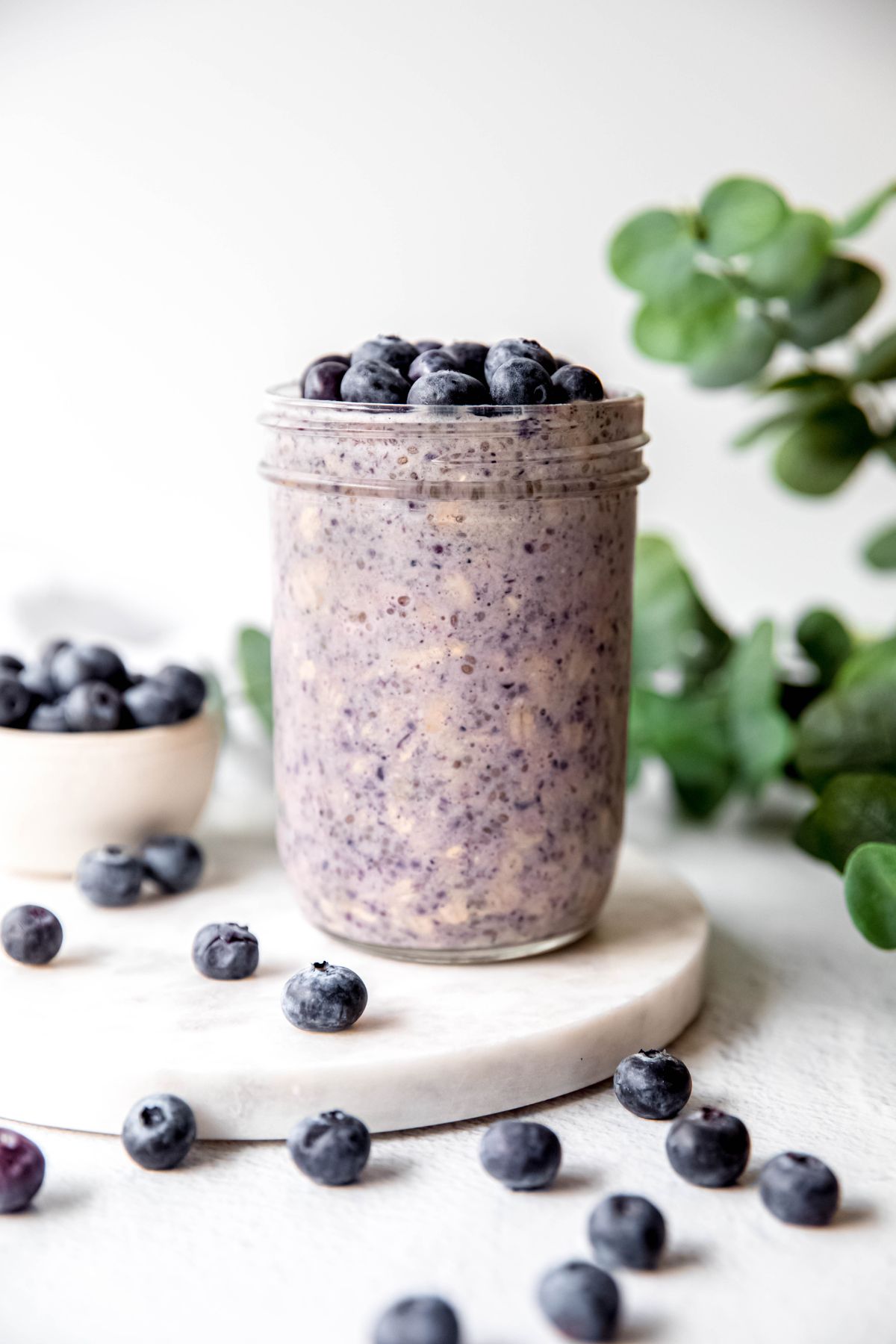 A side shot of the blueberry overnight oats on the counter.