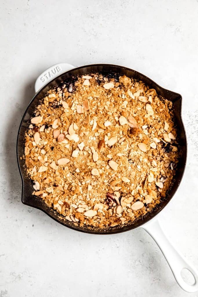A pan of cherry pie crisp after it comes out of the oven.