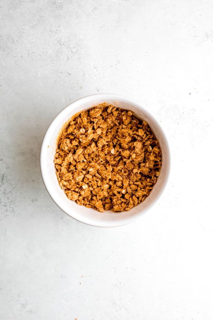 A bowl of the oatmeal streusel topping before adding it to the crisp.