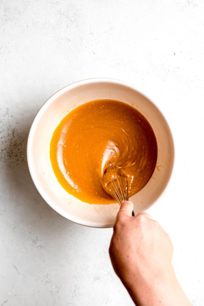 Whisking the wet ingredients together.