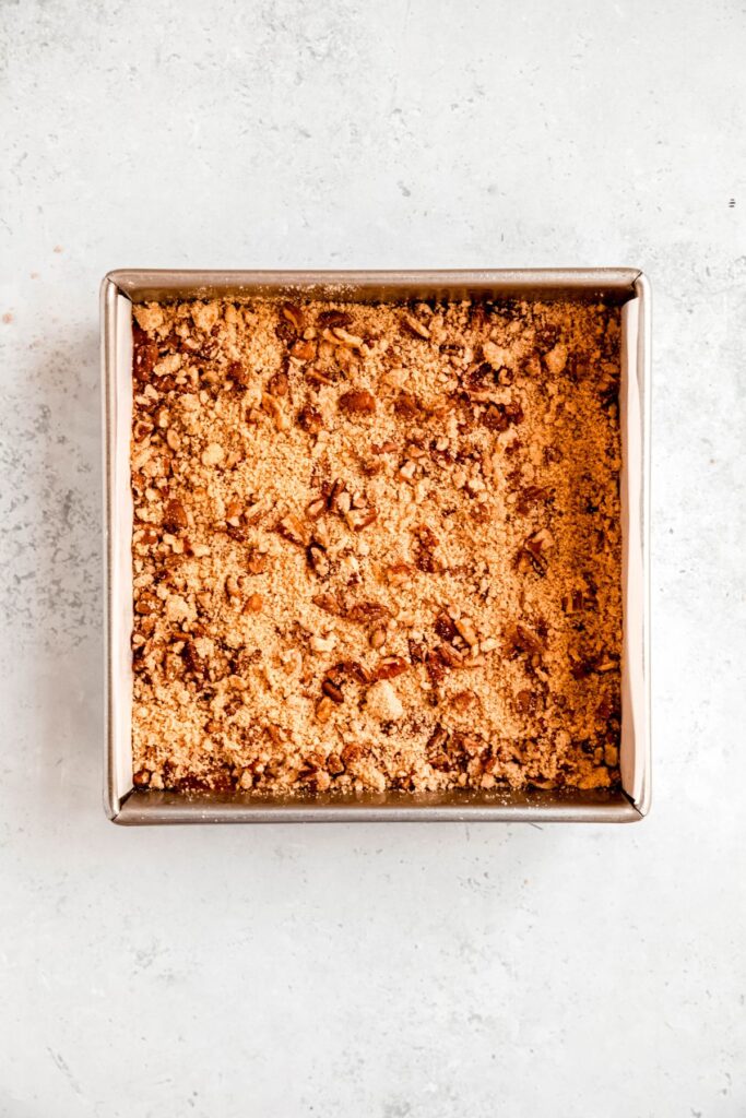 pecan crumble mixture scattered evenly over the pumpkin mixture.