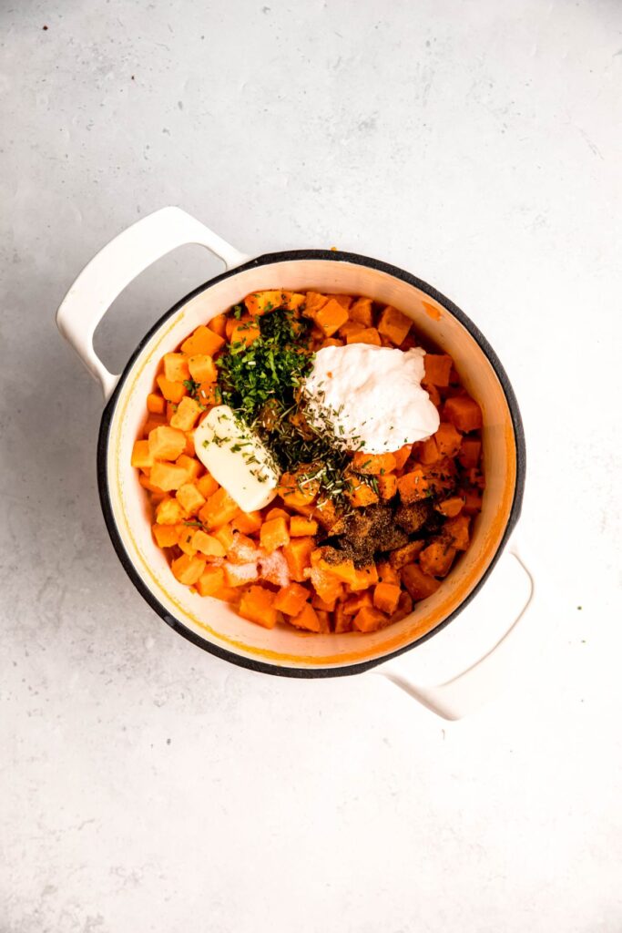 drained boiled sweet potato chunks returned to the pot with the remaining recipe ingredients.