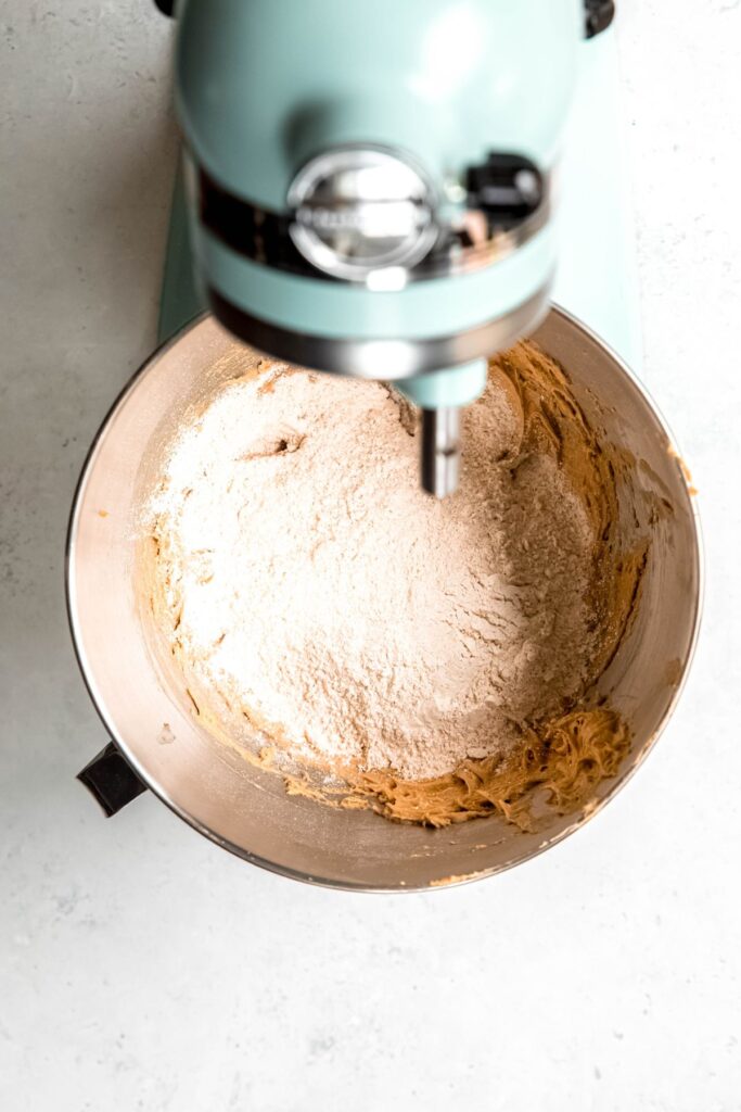 dry ingredients added to the bowl with the wet cookie batter ingredients.