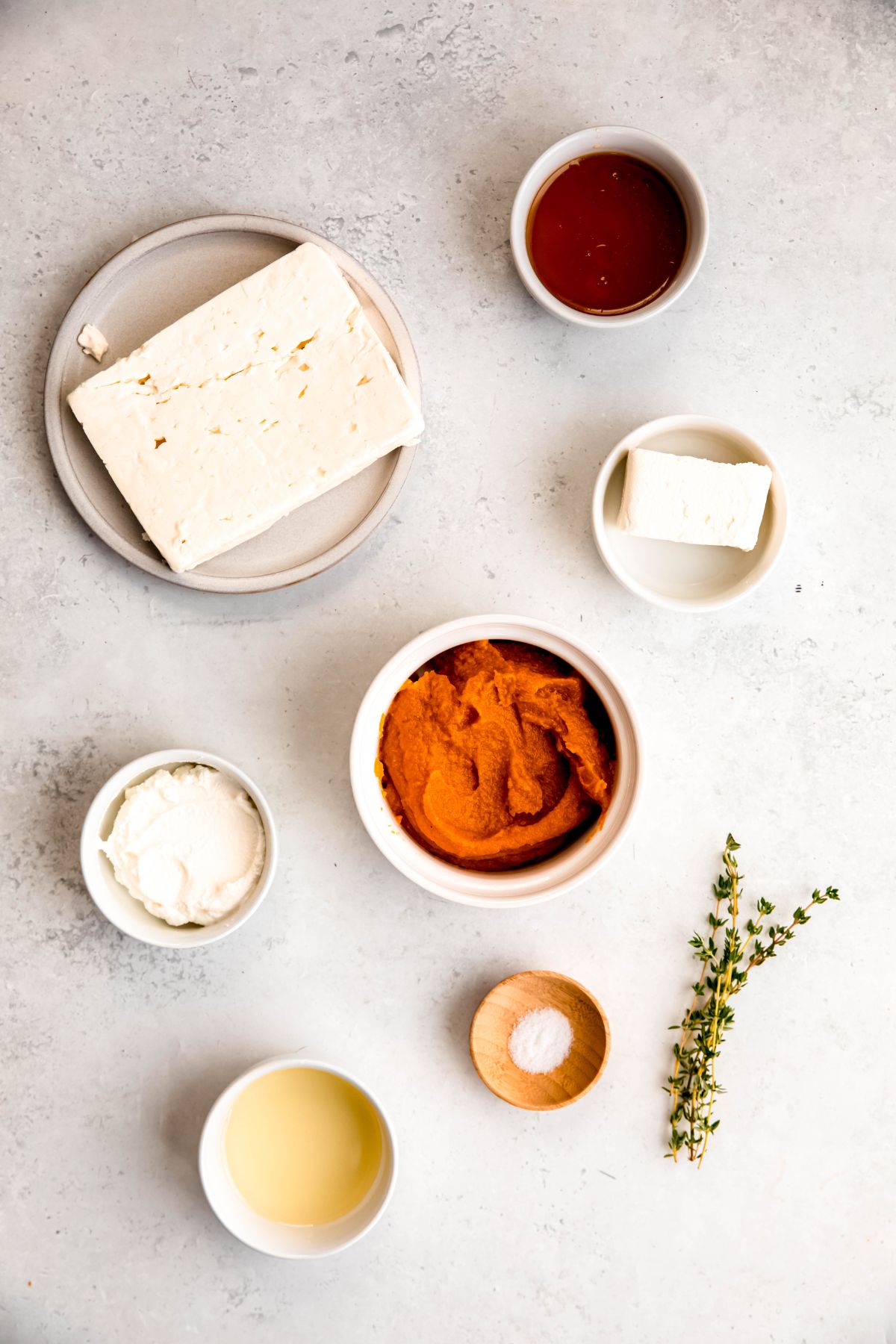 An overhead shot of all the ingredients needed to make pumpkin feta dip.