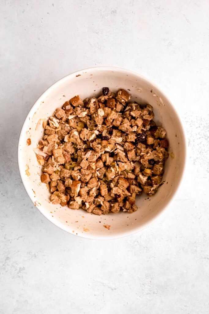 raw turkey stuffing mixture in the mixing bowl after mixing everything together.