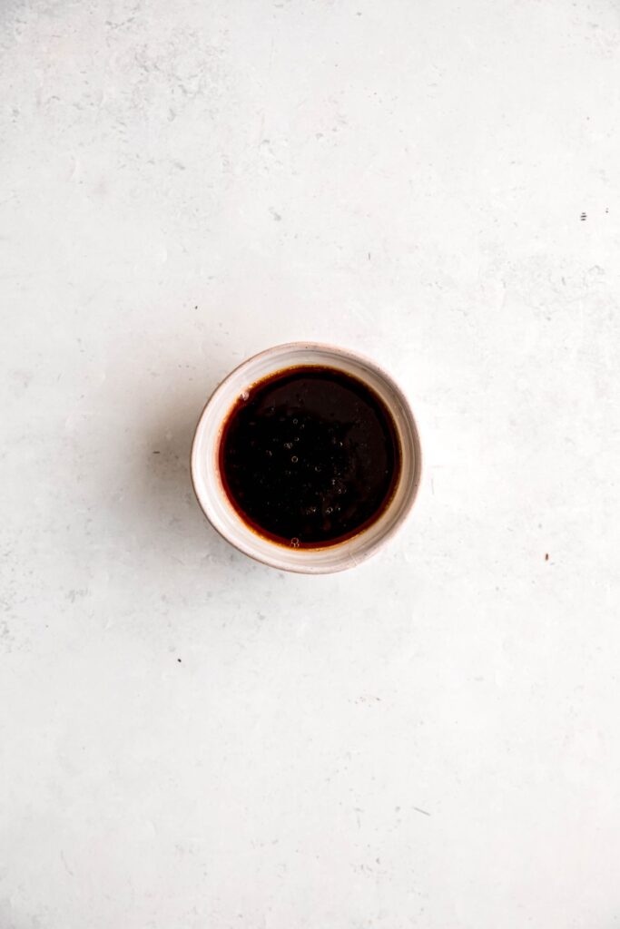 An overhead shot of a small bowl of the stir fry sauce.