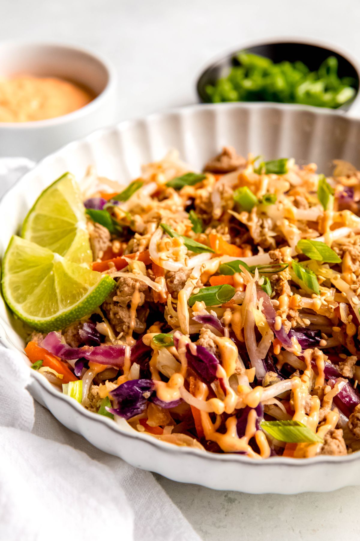 A close-up shot of a dinner bowl of egg roll in a bowl.