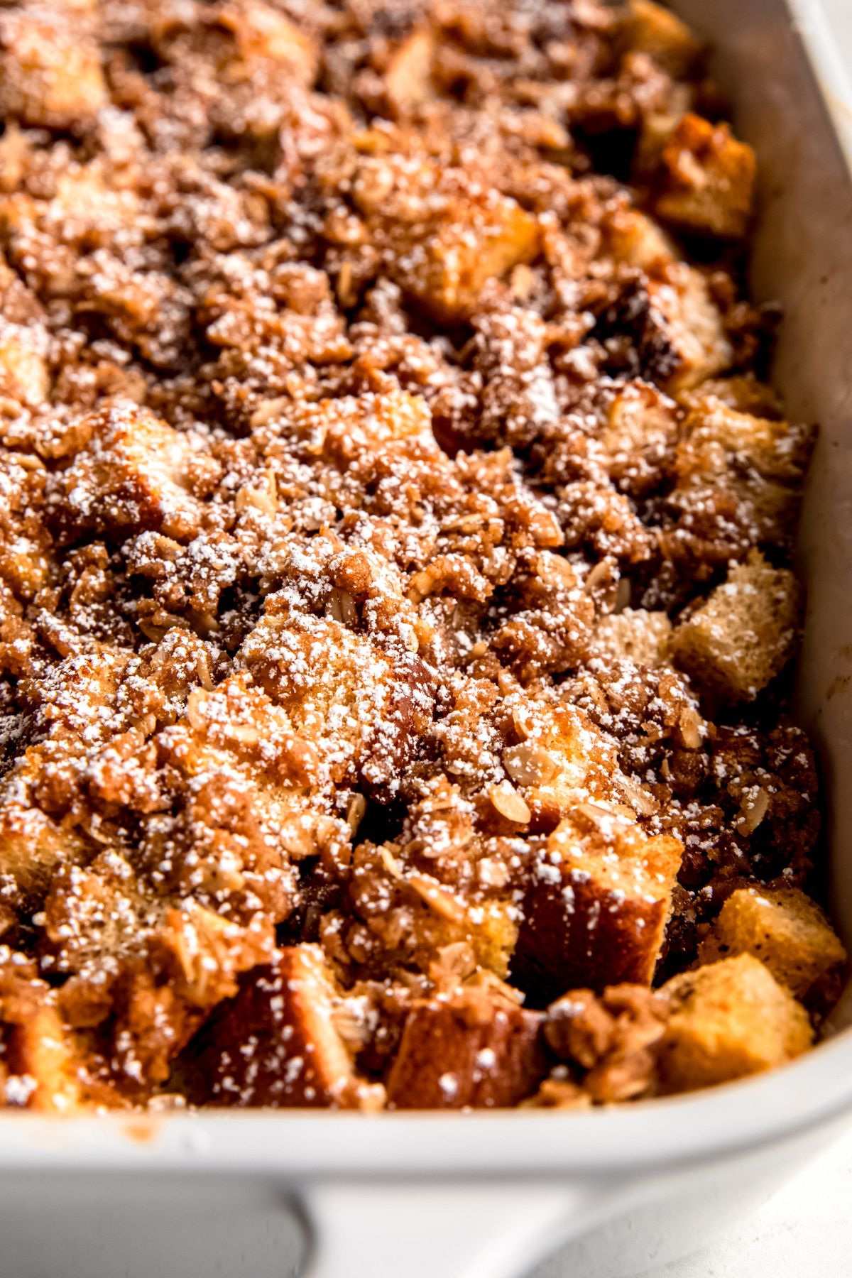A close-up shot of a pan of the eggnog French toast casserole.