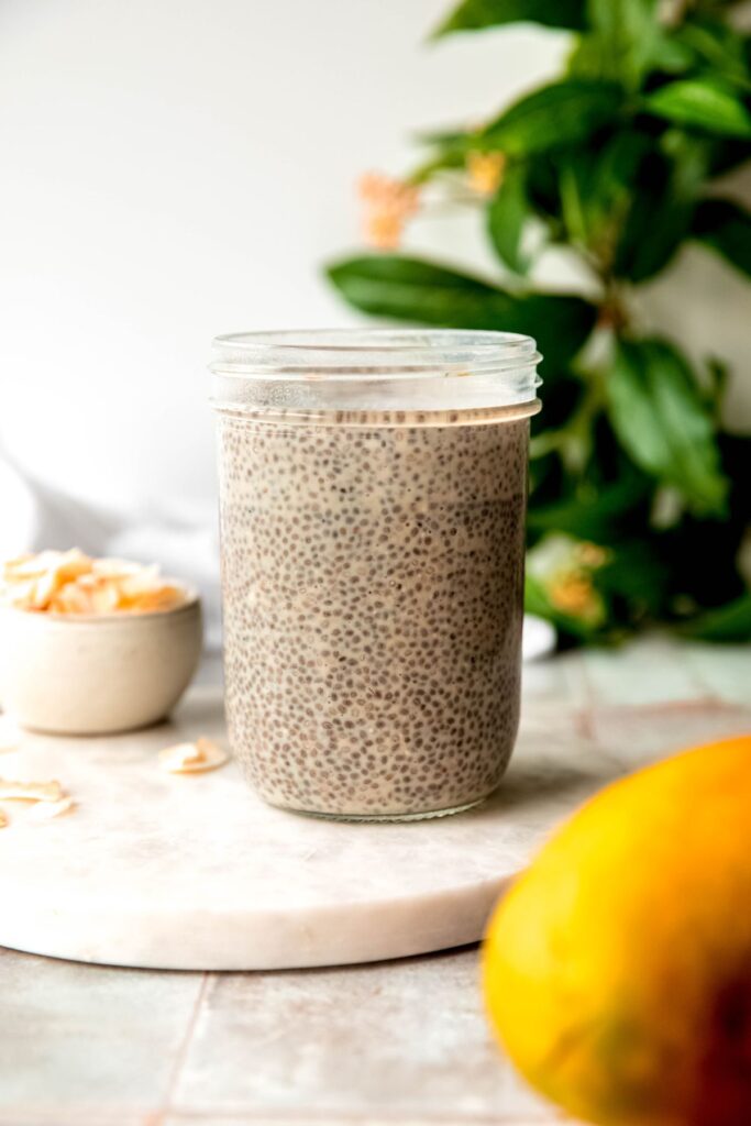 coconut chia seed protein pudding after fully rehydrating; the black chia seeds are suspended in a creamy liquid.