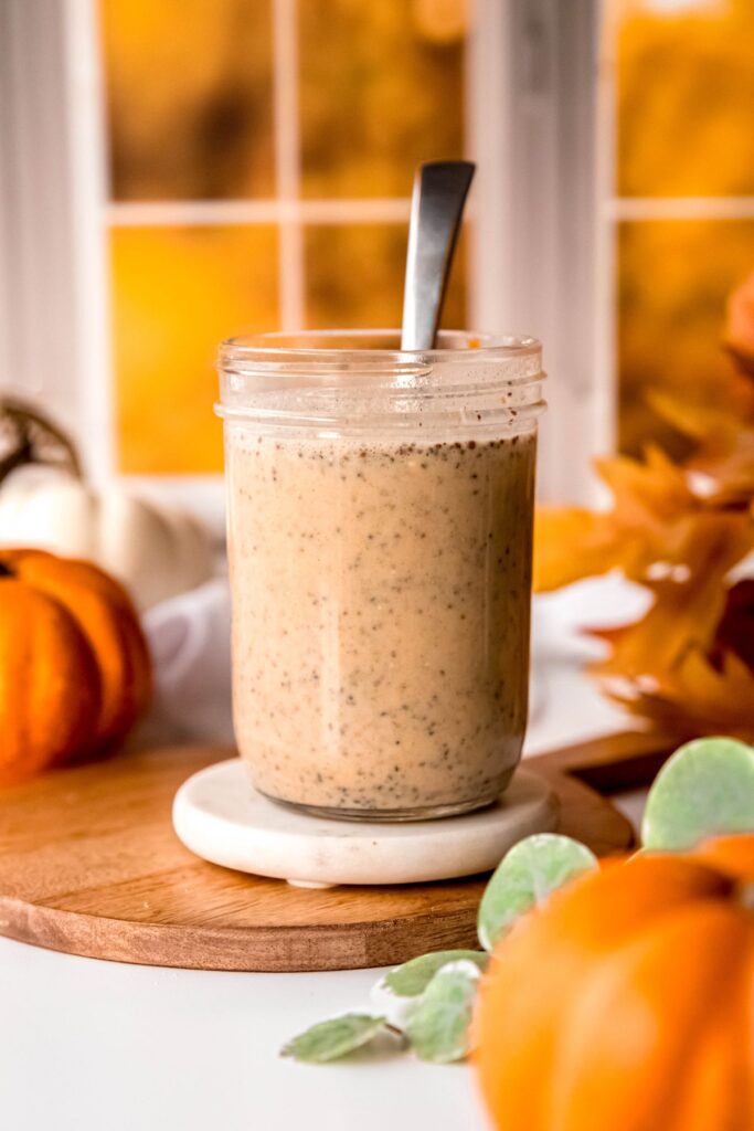 silver spoon in the mason jar after the remaining ingredients were added.