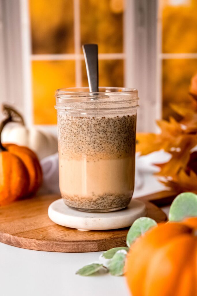 the chia pudding has separated into layers of liquid and chia seeds floating on top and resting on the bottom; this is when to give it one more stir.