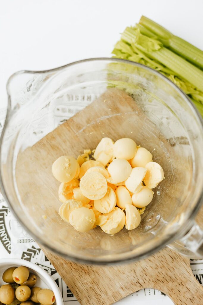 hard boiled egg yolks set aside in a large mixing bowl.