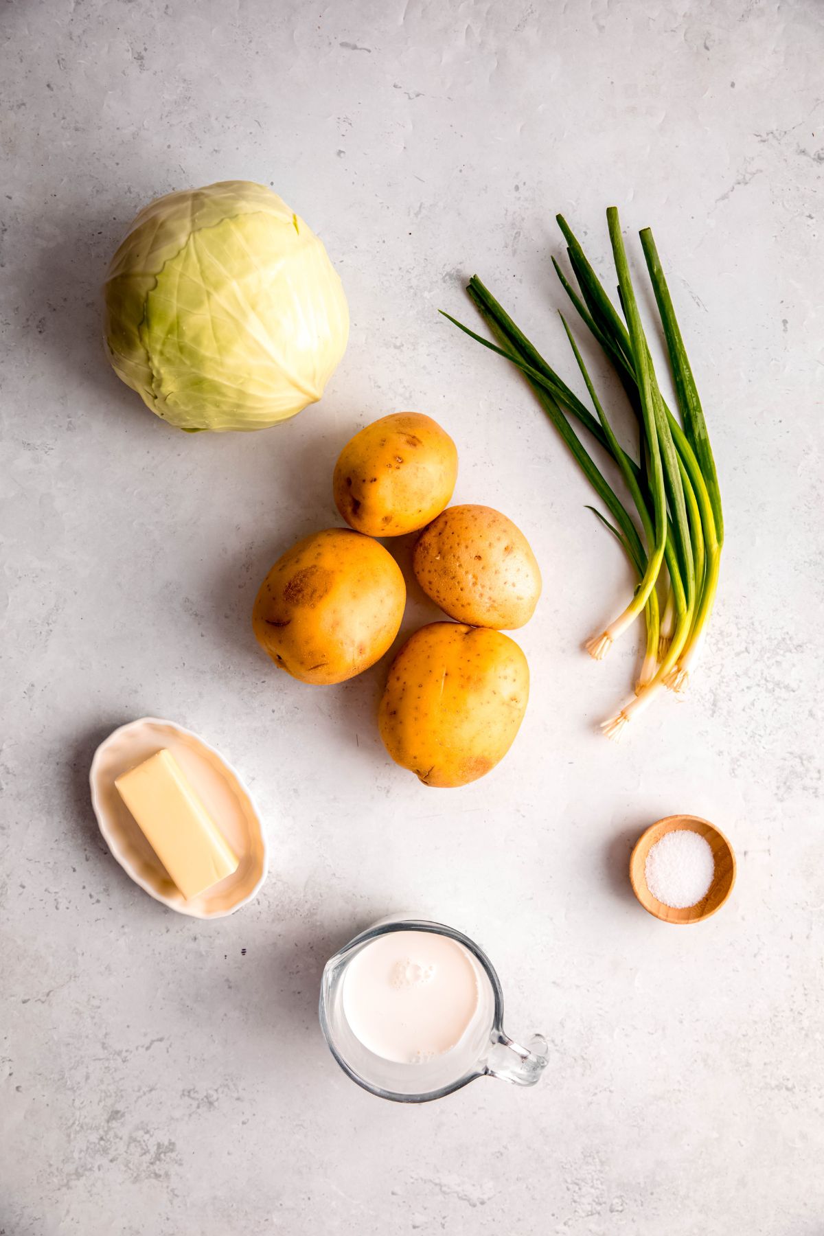 An overhead shot of the ingredients needed to make colannon mash.