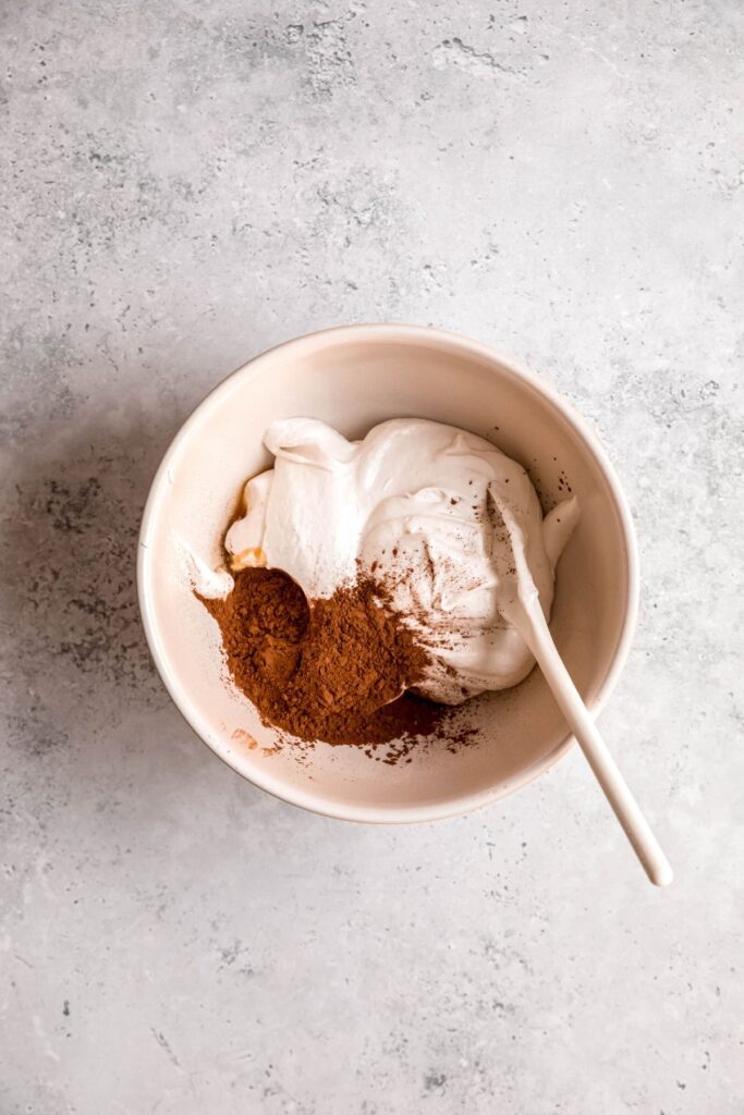 The chocolate fruit dip ingredients in a bowl before mixing.