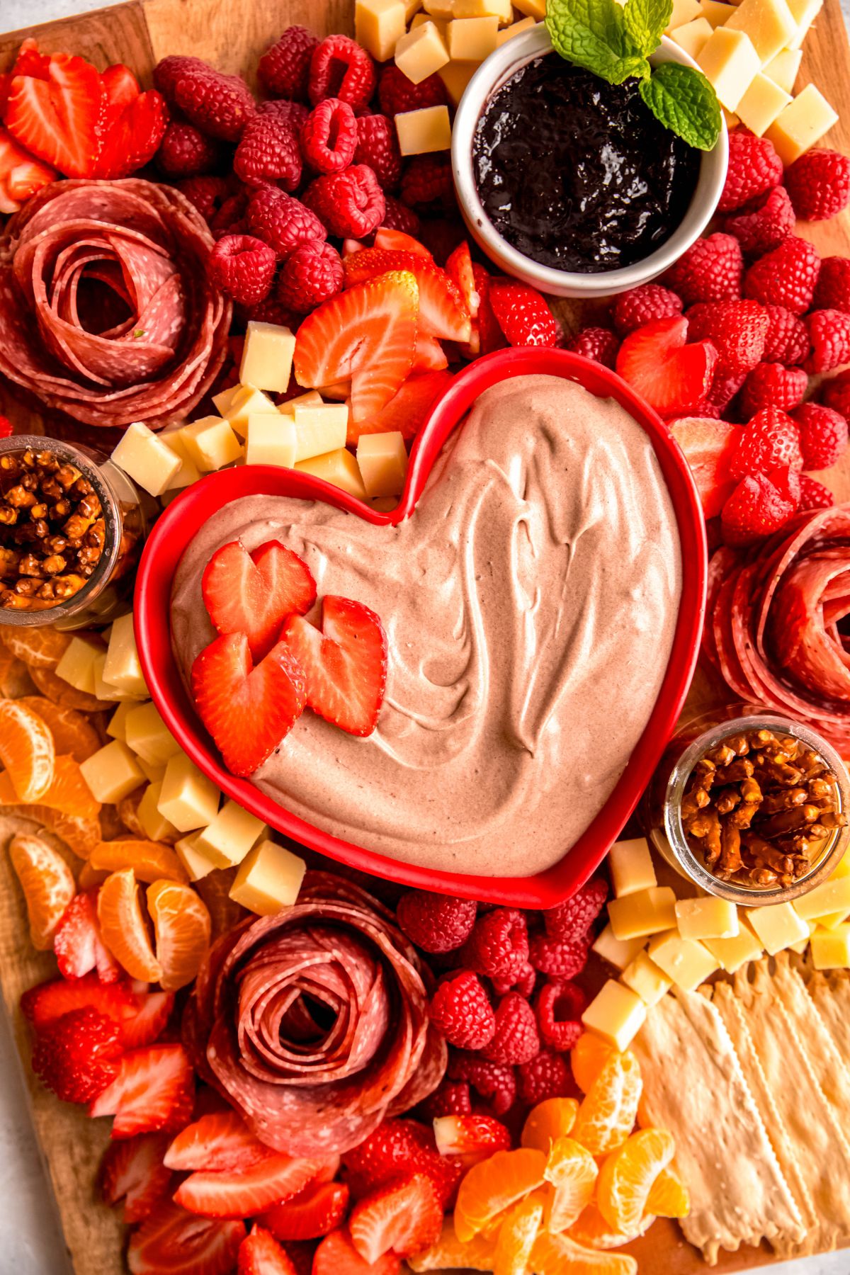 An up-close, overhead shot of the valentine's day charcuterie board.
