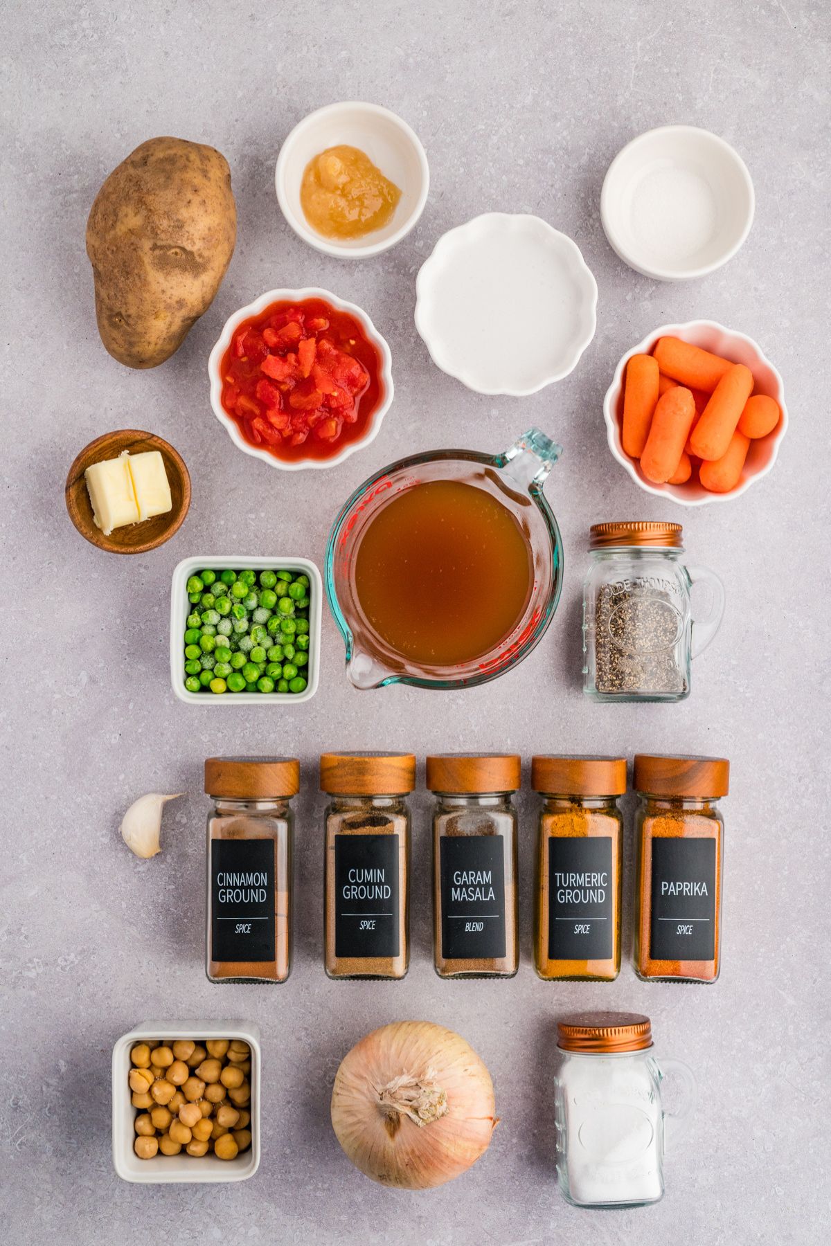 ingredients needed to make Indian-inspired potato curry with chickpeas and coconut milk.