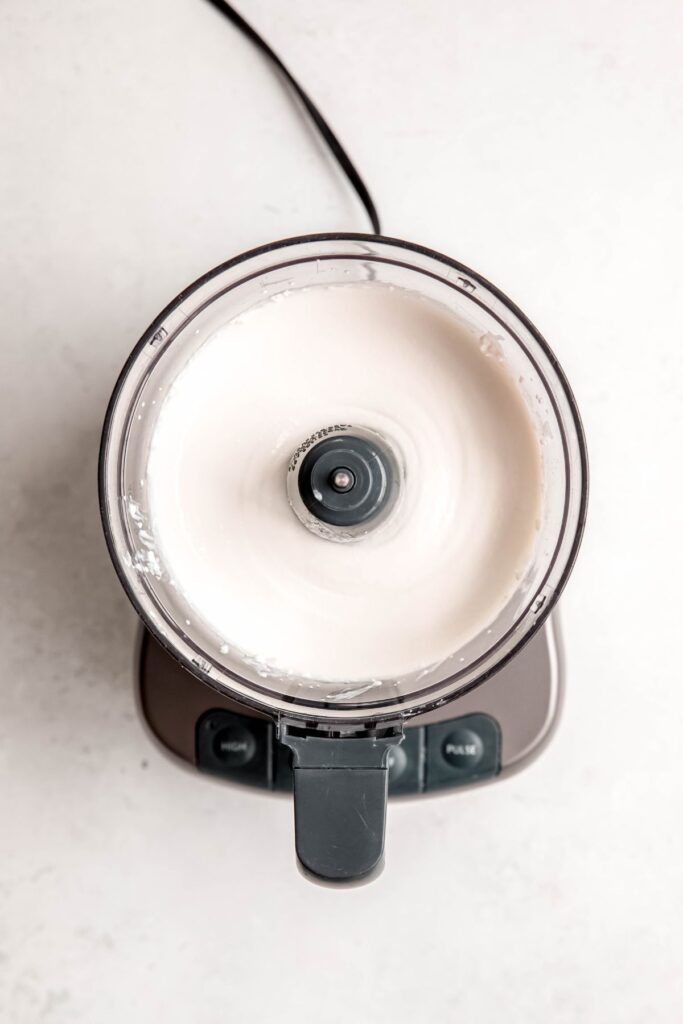 blended cottage cheese in the base of a food processor.