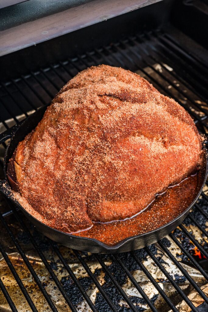 dry rub mixture rubbed all over the honey glazed ham and placed in the preheated Trager.