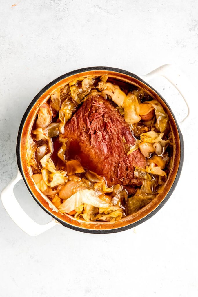 An overhead shot of roasted Dutch oven corned beef, ready to serve.