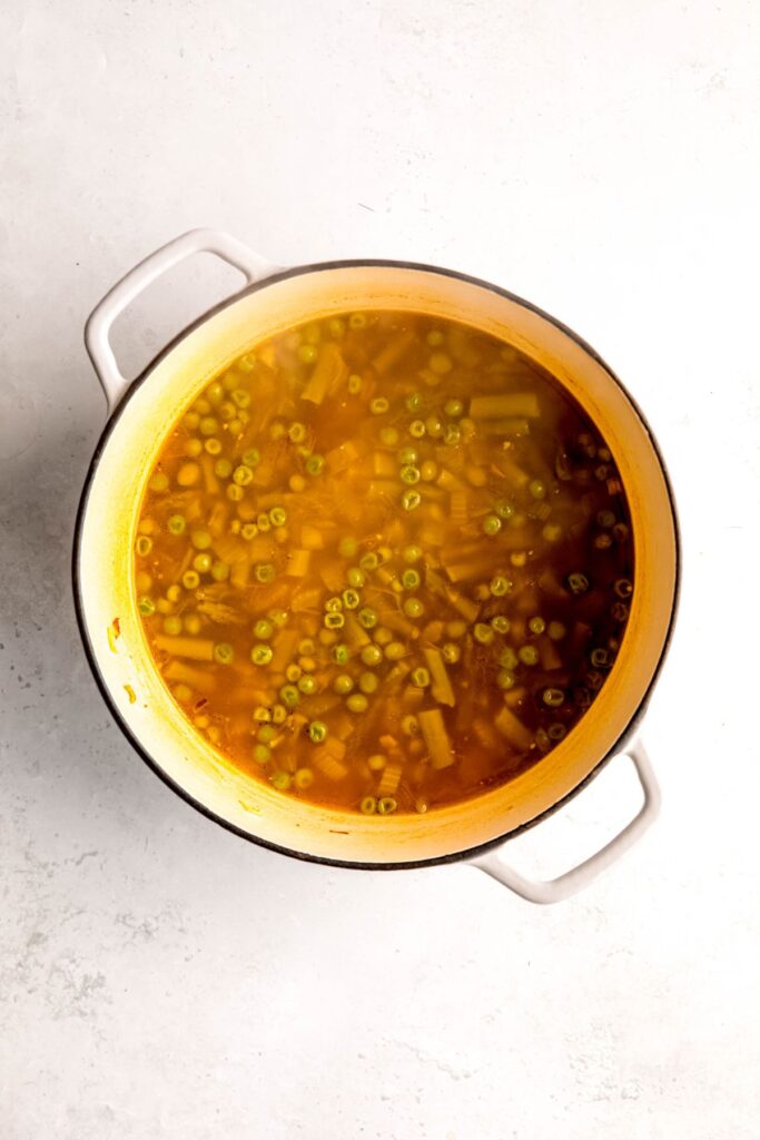 pot of soup after simmering with the veggies and broth until tender.