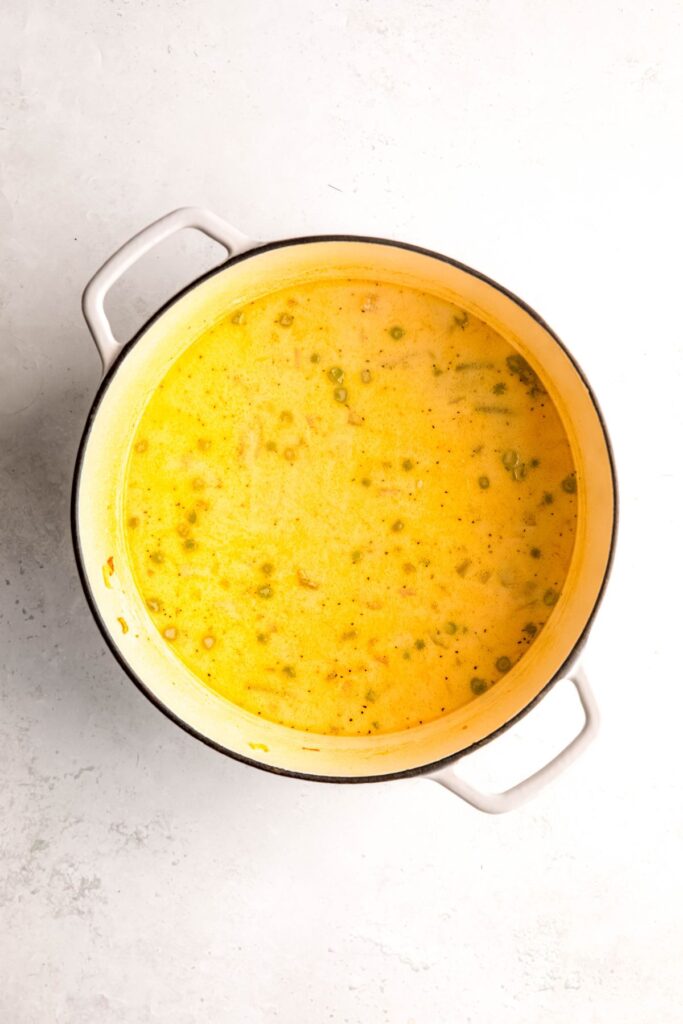 cream added to the pot with the unblended soup.